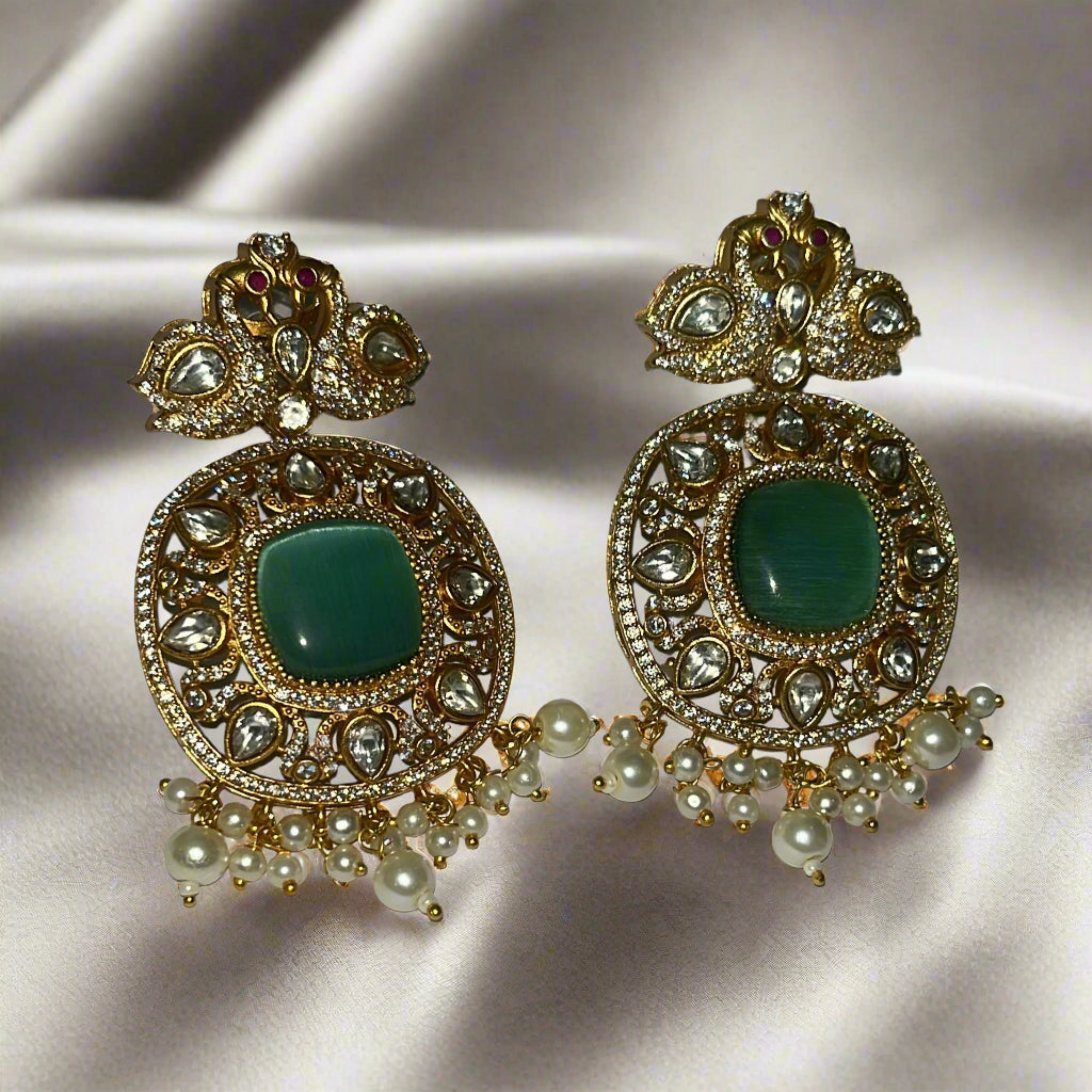 Haripriya Alankaar Set | Kundan Brass Choker with Green Stones & Earrings