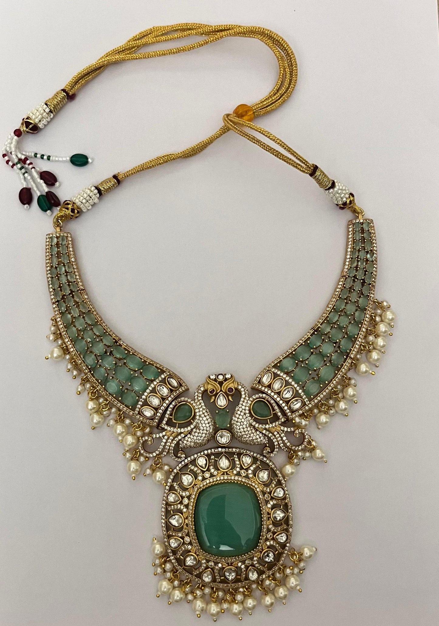 Haripriya Alankaar Set | Kundan Brass Choker with Green Stones & Earrings
