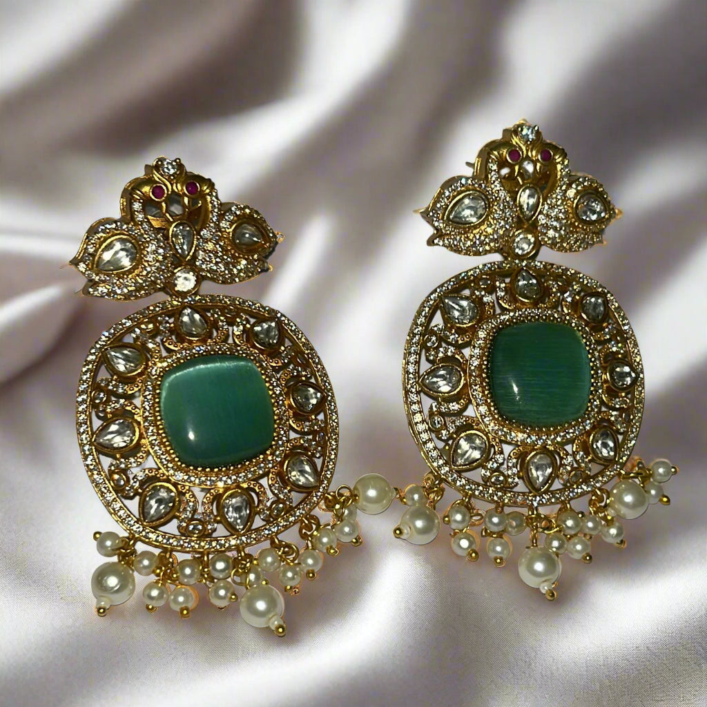 Haripriya Alankaar Set | Kundan Brass Choker with Green Stones & Earrings